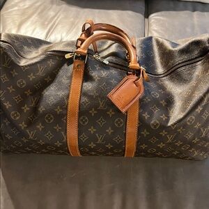 Louis Vuitton Monogram Keepall. Black and Brown Duffel Bag